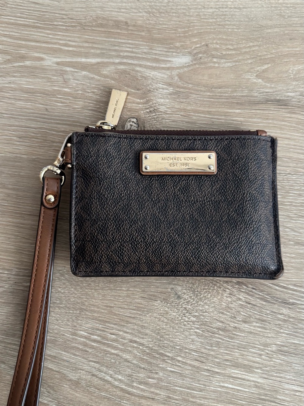 Michael Kors Dark Brown Coated Canvas Wristlet with Gold Plate
